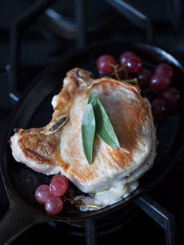Stuffed Pork Chops with Roasted Grapes Image