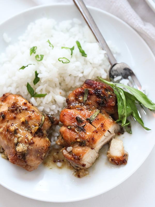 baked honey mustard chicken on plate with rice