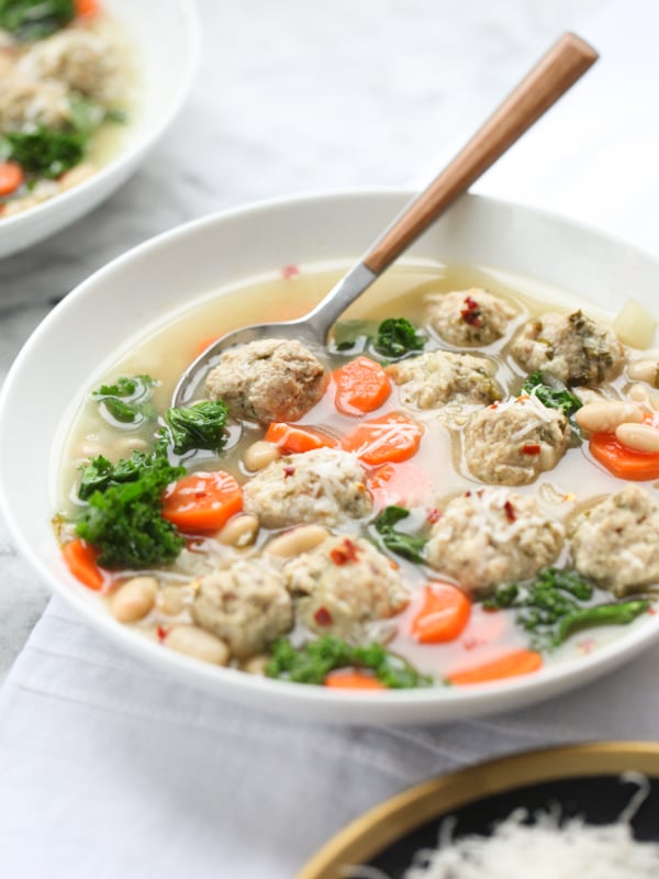 Skinny Slow Cooker Kale and Turkey Meatball Soup is a healthy version of Italian Wedding Soup