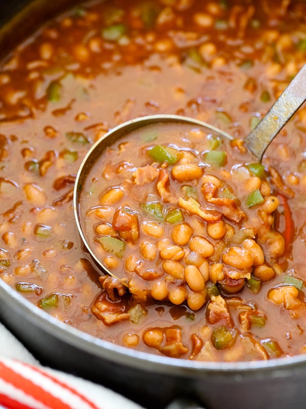 easy baked beans in dutch oven with ladle