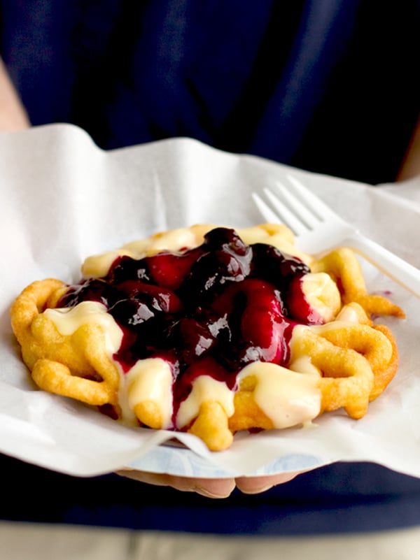 Blueberries and Cream Funnel Cake from tasteandtellblog.com on foodiecrush.com