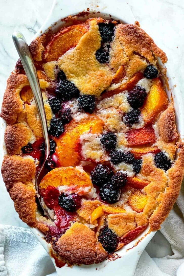 Blackberry and Peach Cobbler with spoon foodiecrush.com