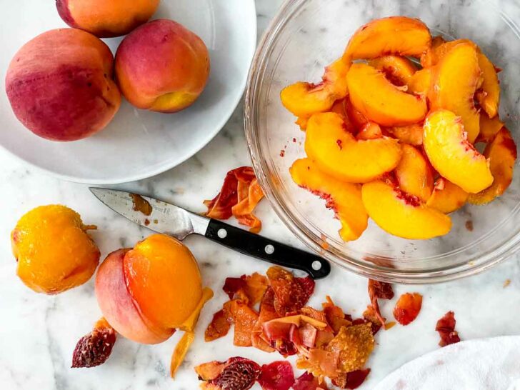 Peeled Peaches in bowl foodiecrush.com