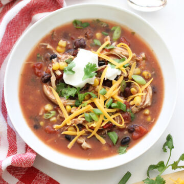 Slow Cooker Chicken Enchilada Soup #recipe on foodiecrush.com