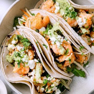 Shrimp Tacos with Avocado Crema foodiecrush.com