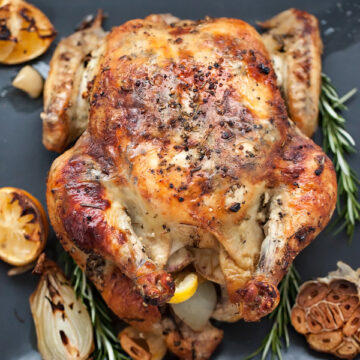 Oven Roasted Chicken with Lemon Rosemary Garlic Butter from foodiecrush.com on foodiecrush.com