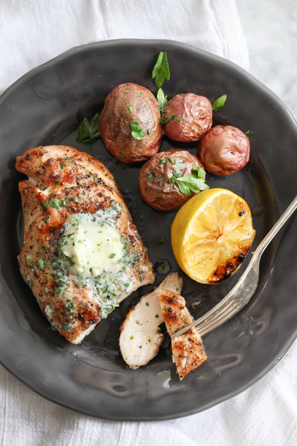 Grilled Chicken Breasts with Chive and Herb Butter Image