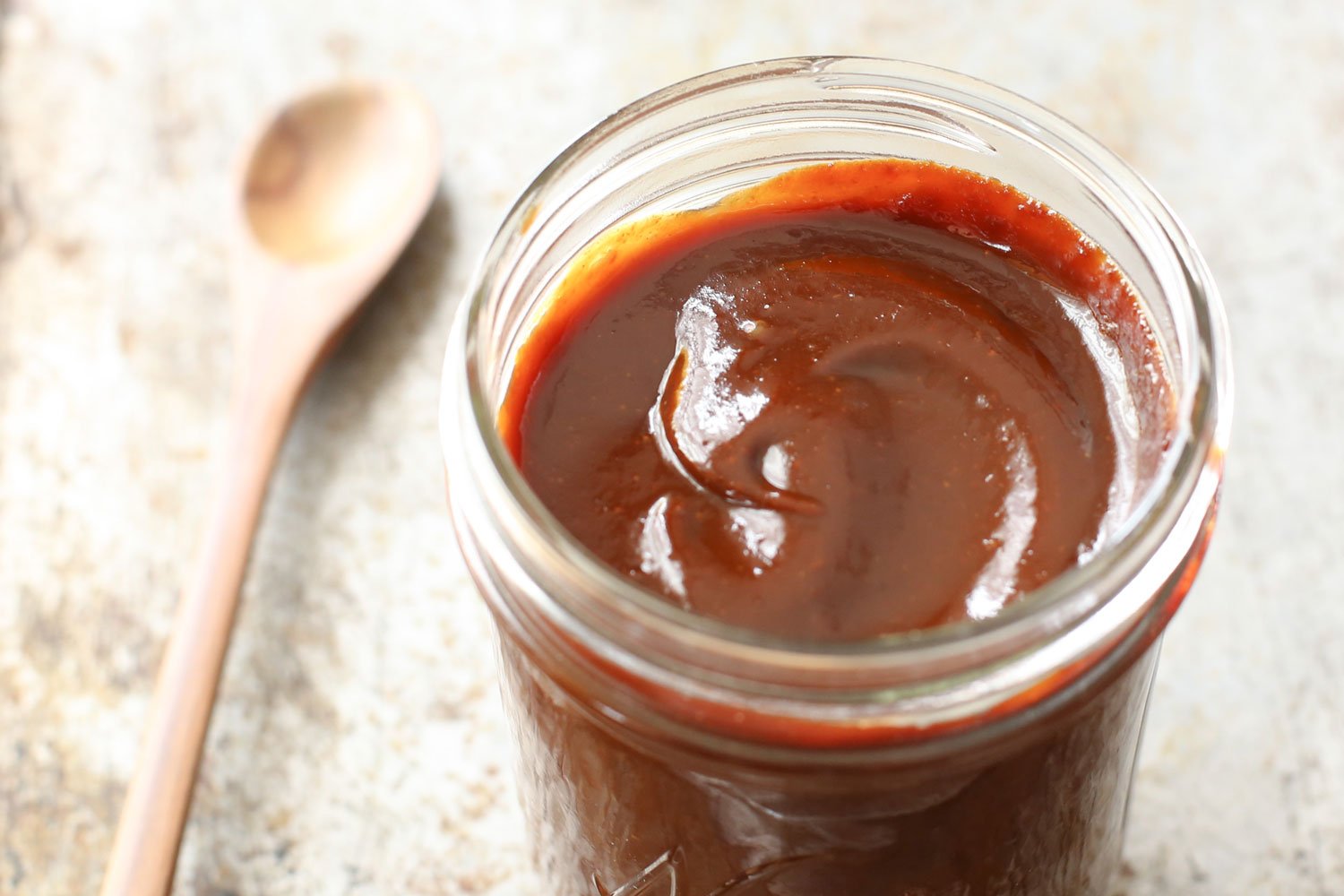 Sriracha Bourbon Barbeque Sauce from Barefeet In the Kitchen on foodiecrush.com 