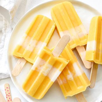 Creamy Mango Popsicles foodiecrush.com