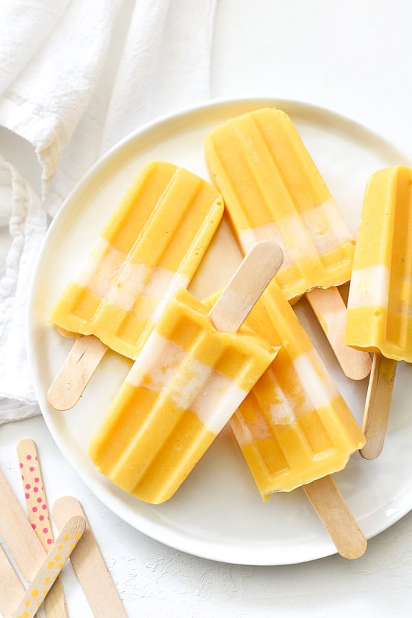 Creamy Mango Popsicles | foodiecrush.com #healthy #recipes #easy #creamy