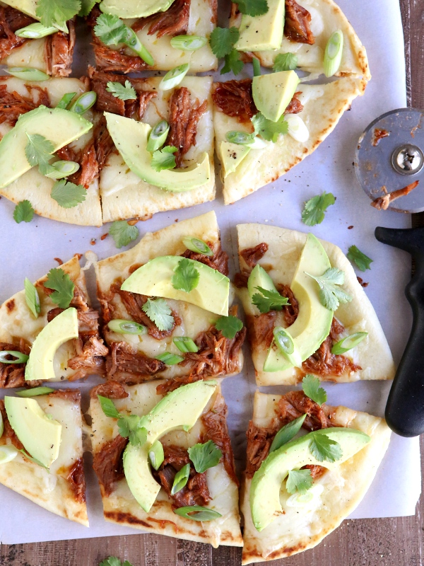 BBQ Pulled Pork Flatbread Pizzas from CompletelyDelicious.com on foodiecrush.com