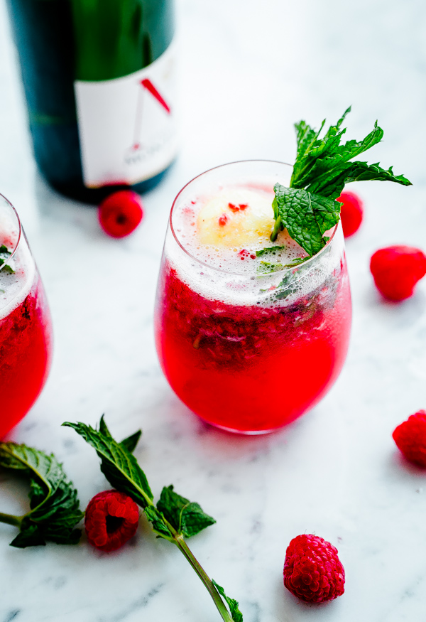 Sorbet Prosecco Floats with Muddled Raspberries and Fresh Mint from Blogging Over Thyme | foodiecrush.com 