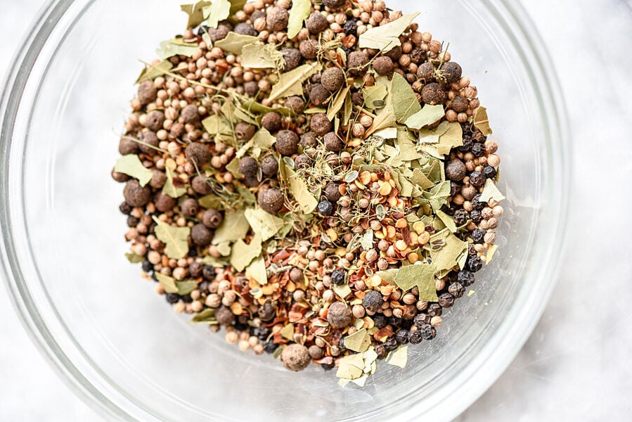 homemade pickling spice in glass bowl