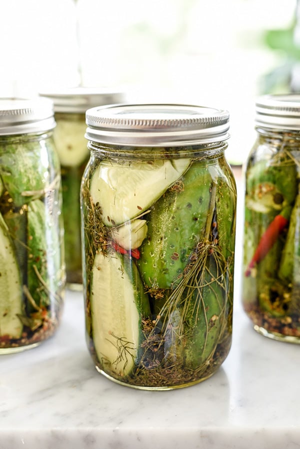 four jars of spicy pickles