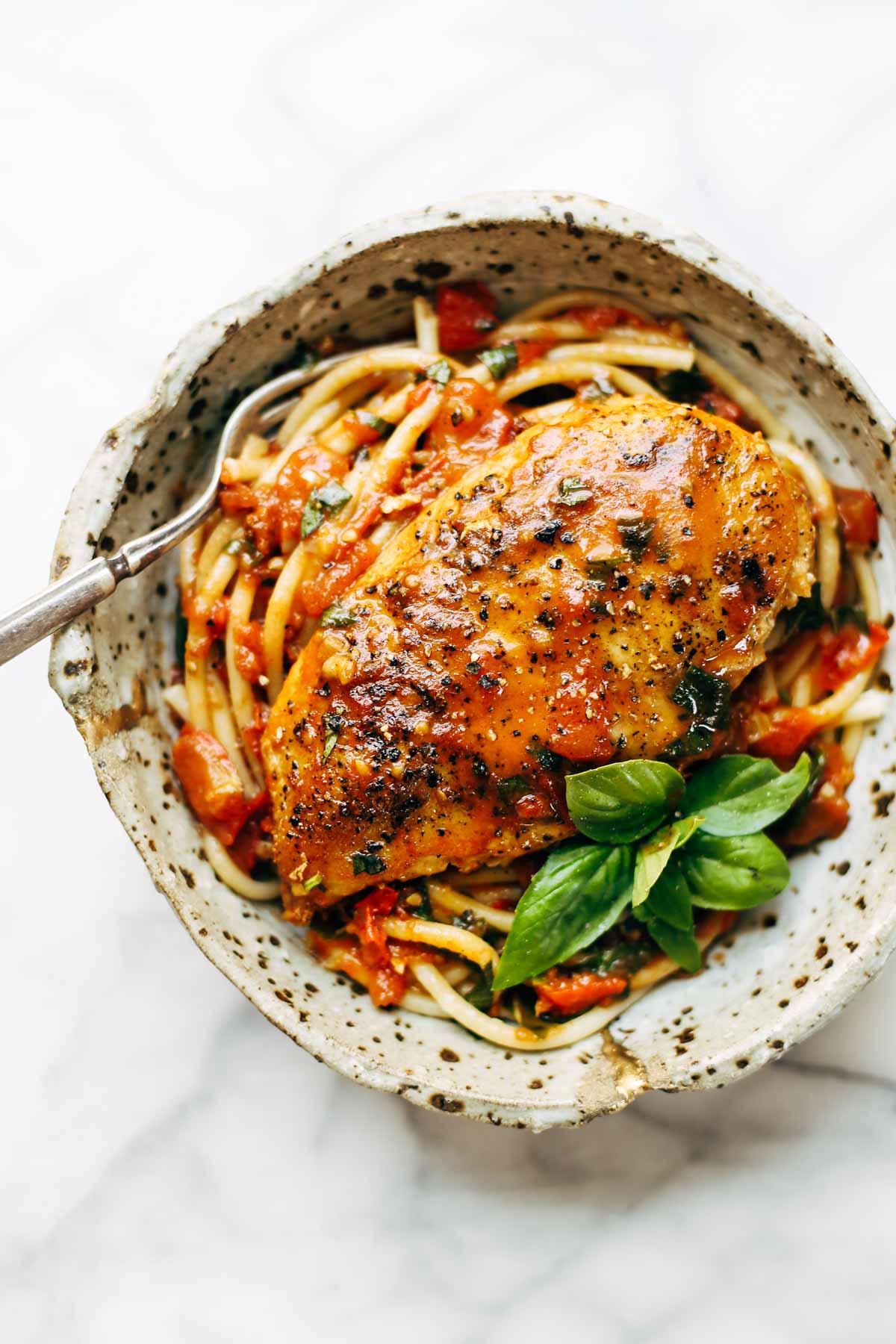 Garlic Basil Chicken with Tomato Butter Sauce from Pinch of Yum | foodiecrush.com 