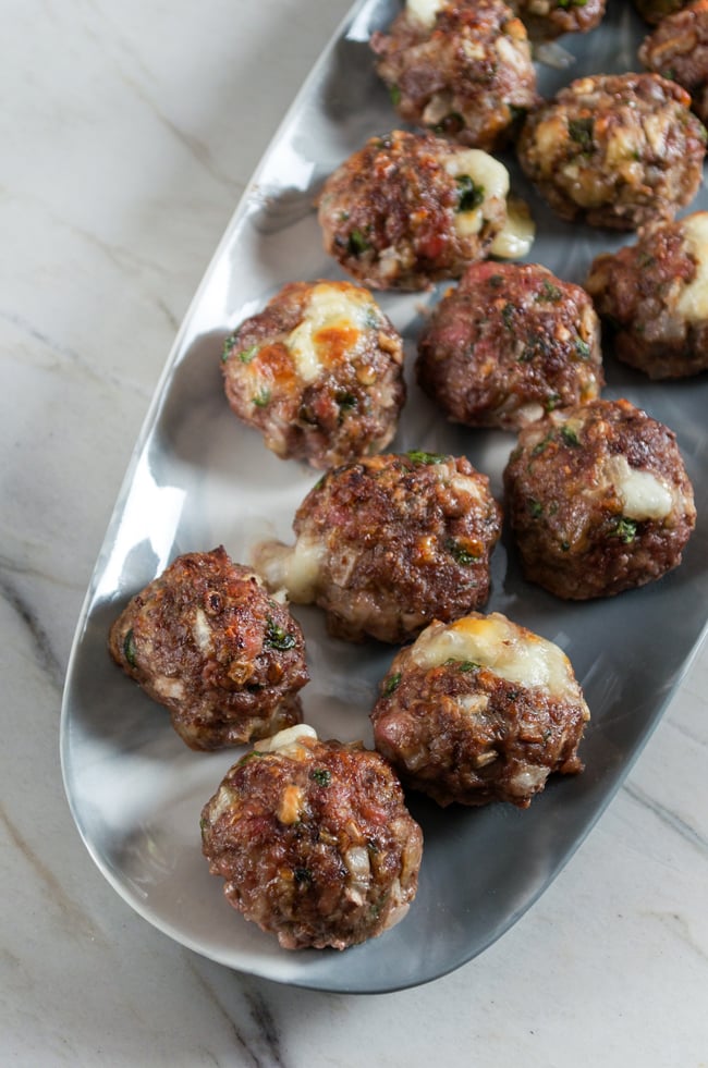 Cheese Stuffed Meatballs from Sprinkled Side Up on foodiecrush.com 