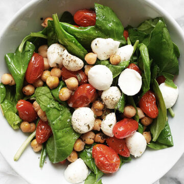 Roasted Chickpeas and Tomatoes Caprese Spinach Salad | foodiecrush.com