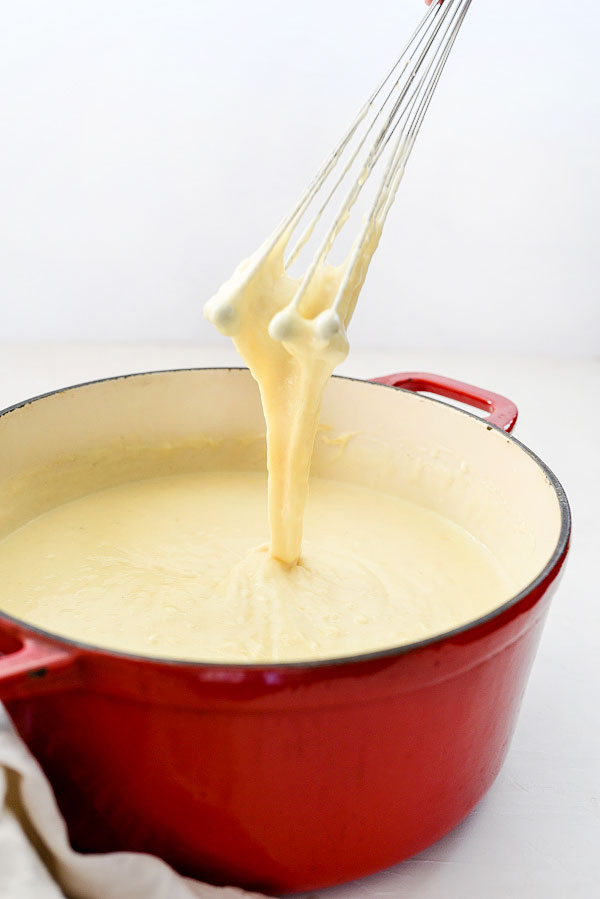 cheese sauce in large Dutch oven