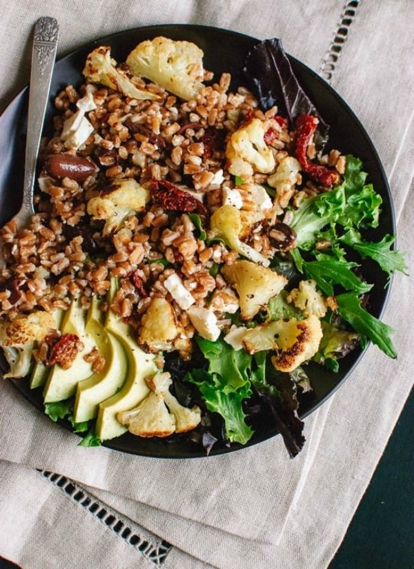 Roasted Cauliflower and Farro Salad with Feta and Avocado from cookieandkate.com on foodiecrush.com