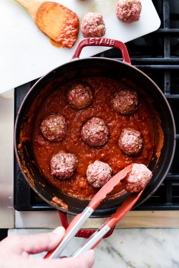 Cooking Meatballs in Sauce | foodiecrush.com #easy #Italian #homemade