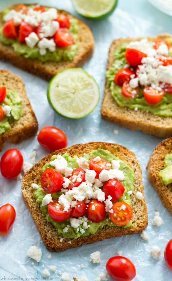 Greek Avocado Toast with Cherry Tomatoes from wholeandheavenlyoven.com on foodiecrush.com
