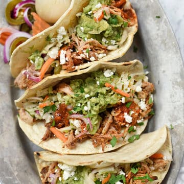 Slow Cooker Smoky Pulled Pork Tacos | foodiecrush.com