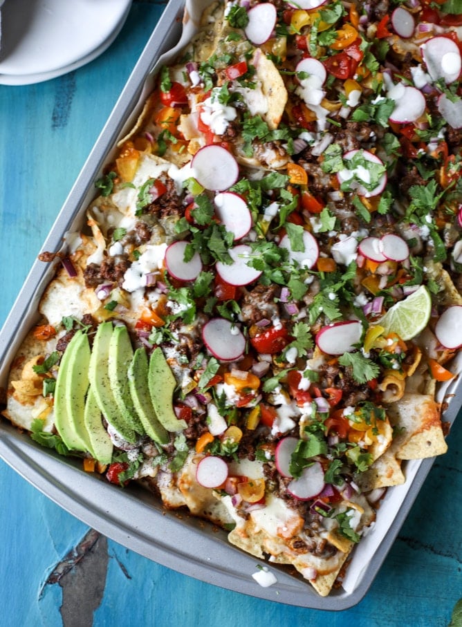 Sheet Pan Green Chile Nachos from How Sweet It Is on foodiecrush.com