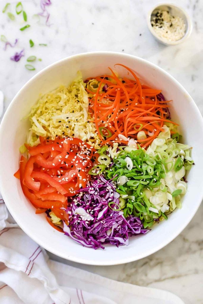Quick Korean Spicy Slaw with cabbages, onion, ginger, red bell pepper | foodiecrush.com