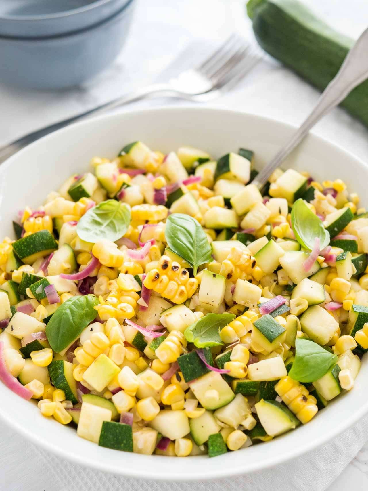 Roasted Corn Zucchini Salad from platedcravings.com on foodiecrush.com