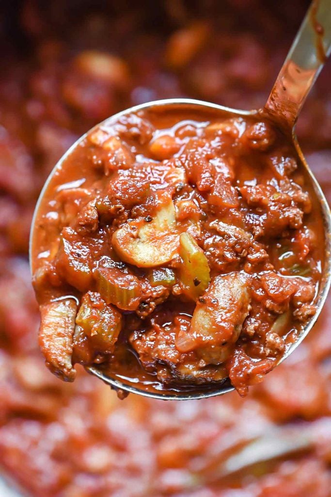 ladle full of easy homemade spaghetti sauce