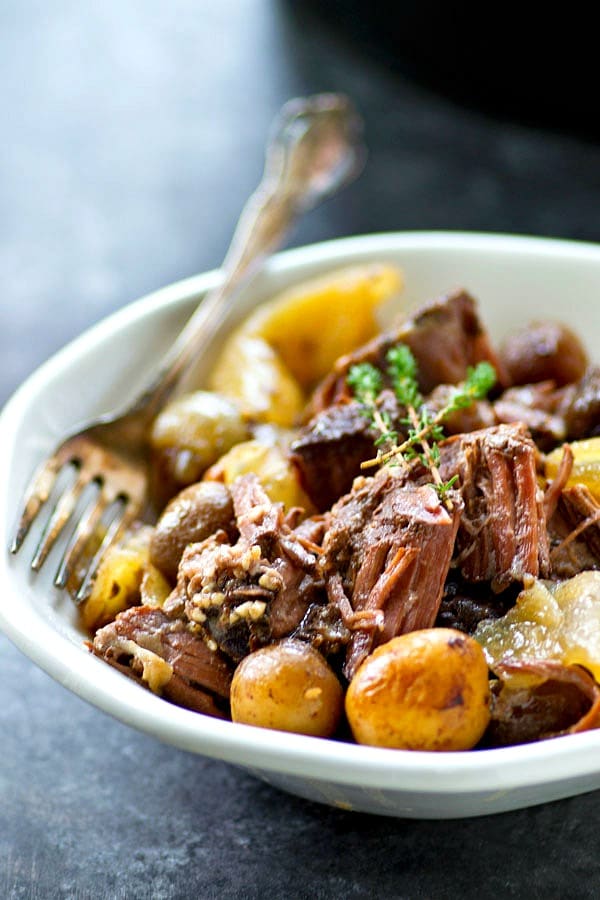 Red Wine Crockpot Beef with Fingerling Potatoes from wholeandheavenlyoven.com on foodiecrush.com