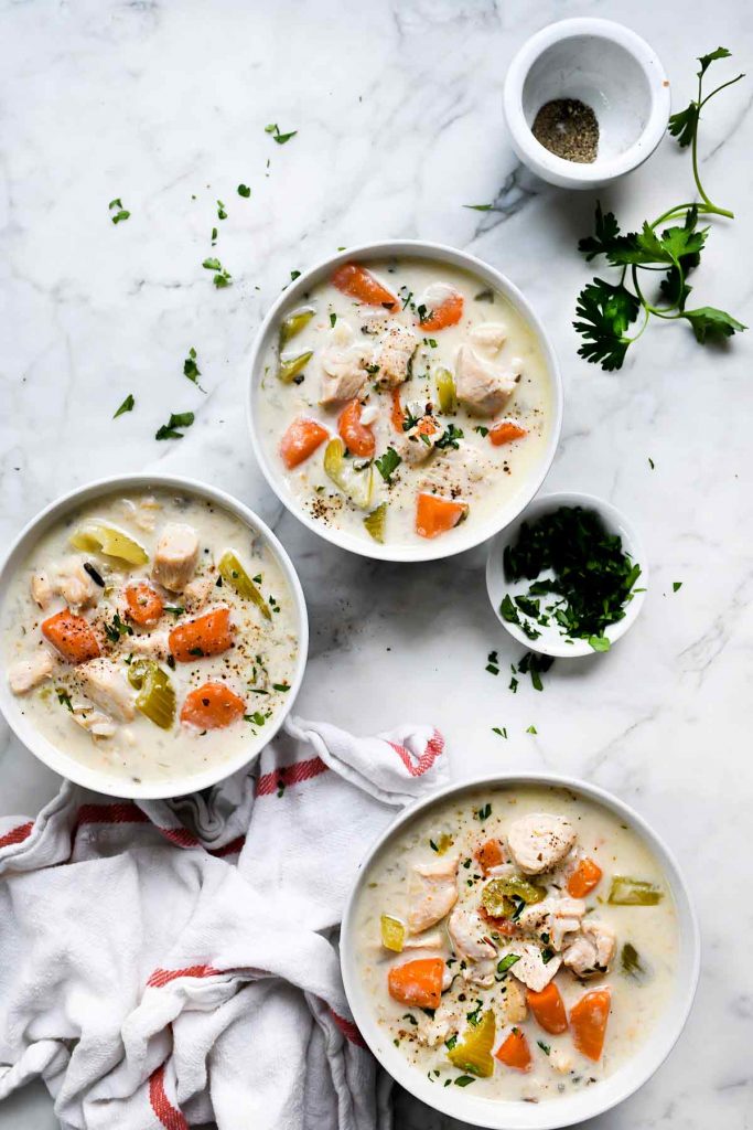 three bowls of instant pot chicken and wild rice soup