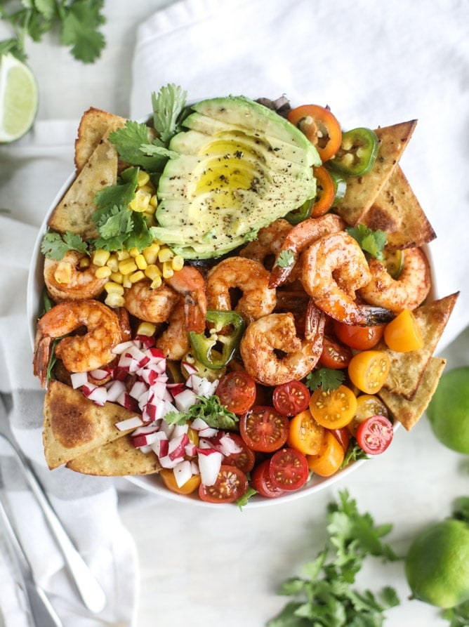 Spicy Shrimp Bowls with Parmesan Quinoa and Garlic Kale from thegarlicdiaries.com on foodiecrush.com