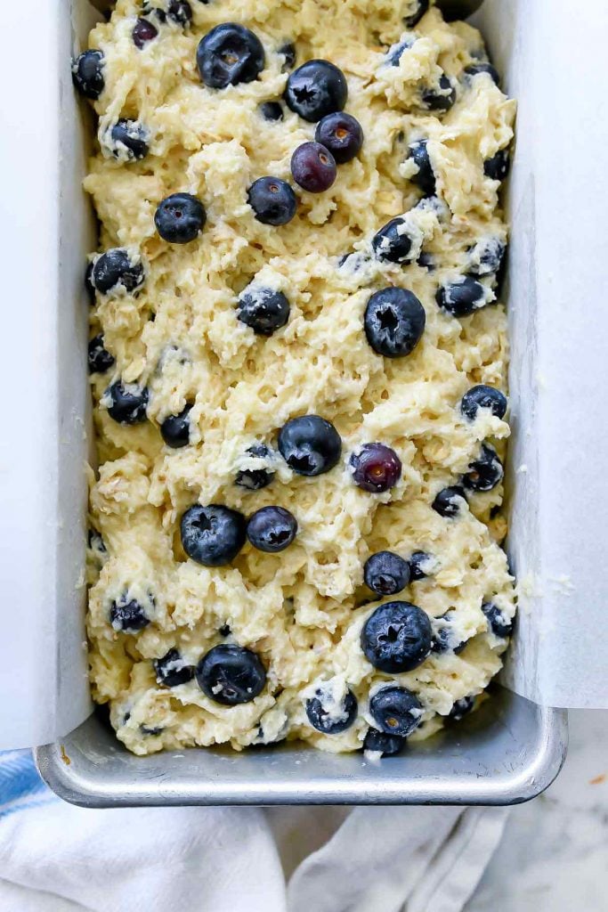uncooked loaf of blueberry quick bread