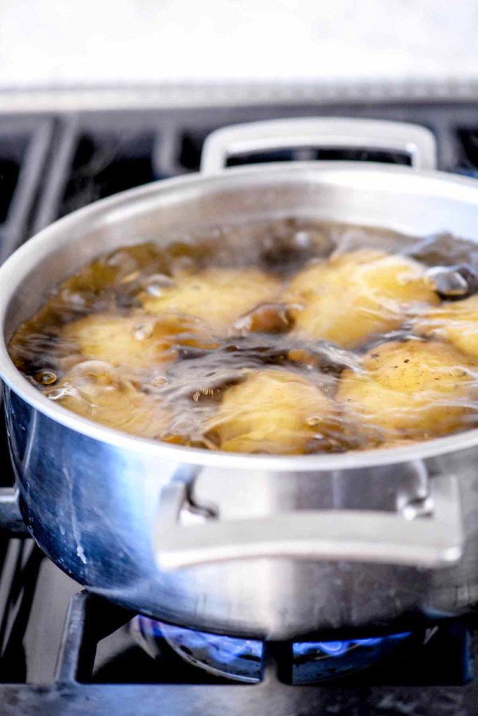 Boiling potatoes on the stove for the best mashed potatoes