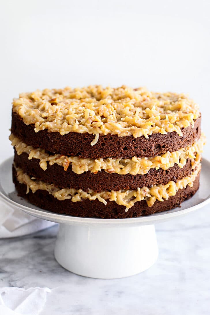 German Chocolate Cake layers on stand