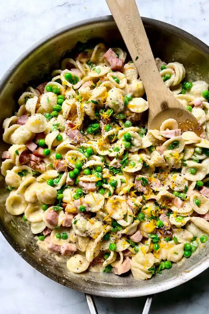 Creamy Lemon Pasta with Ham and Peas from foodiecrush.com on foodiecrush.com