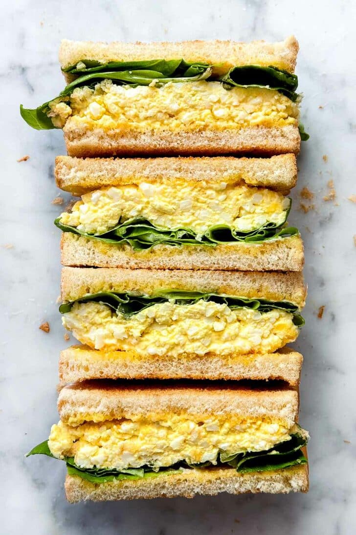 Stack of Egg Salad Sandwich cut in half foodiecrush.com
