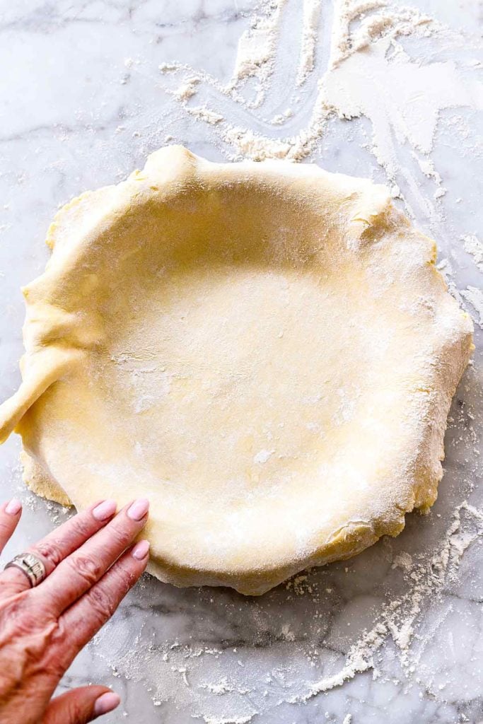shaping all butter pie crust to fit pie plate