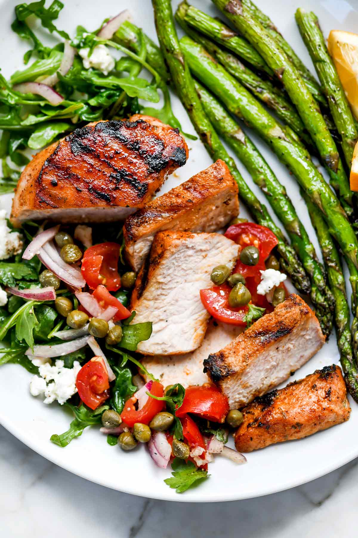 Mediterranean Grilled Pork Chops with Tomato Salad | foodiecrush.com #grilled #porkchops #recipes #dinner