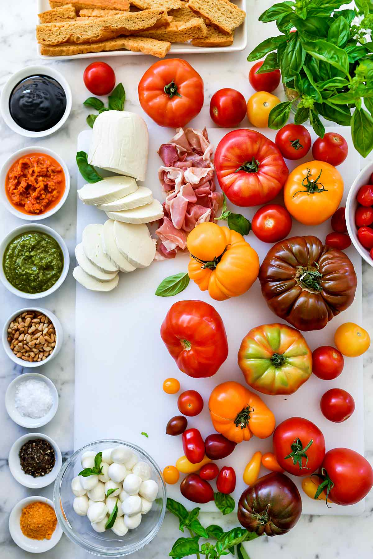 https://www.foodiecrush.com/wp-content/uploads/2019/07/Caprese-Tomato-Salad-Bar-foodiecrush.com-001.jpg