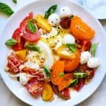 Caprese Salad with Heirloom Tomatoes | foodiecrush.com #caprese #salad #tomatoes #heirloom #basil #recipes