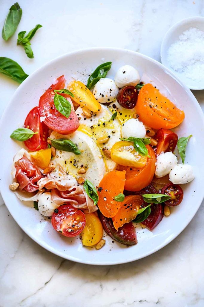 Caprese Salad with Heirloom Tomatoes | foodiecrush.com #caprese #salad #tomatoes #heirloom #basil #recipes