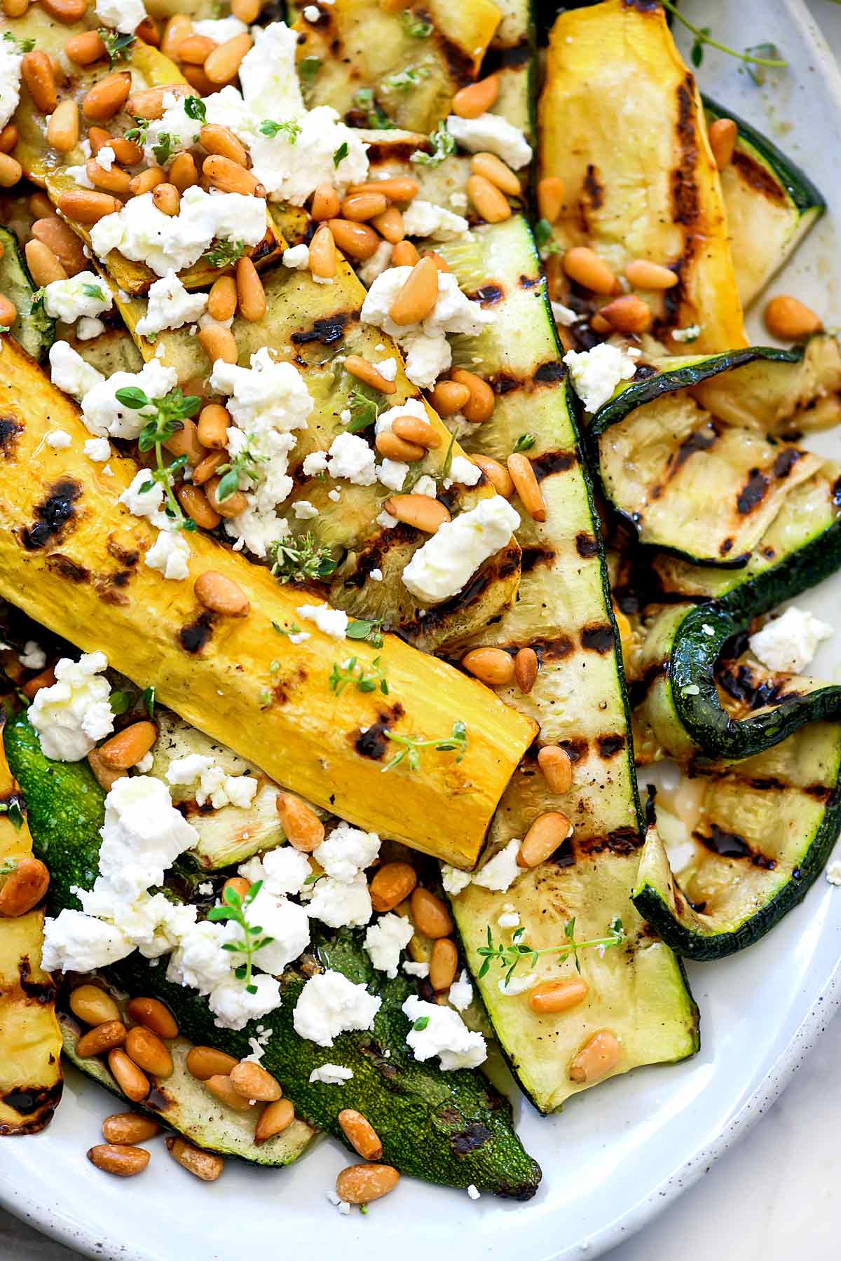 Grilled Zucchini With Goat Cheese and Pine Nuts | foodiecrush.com