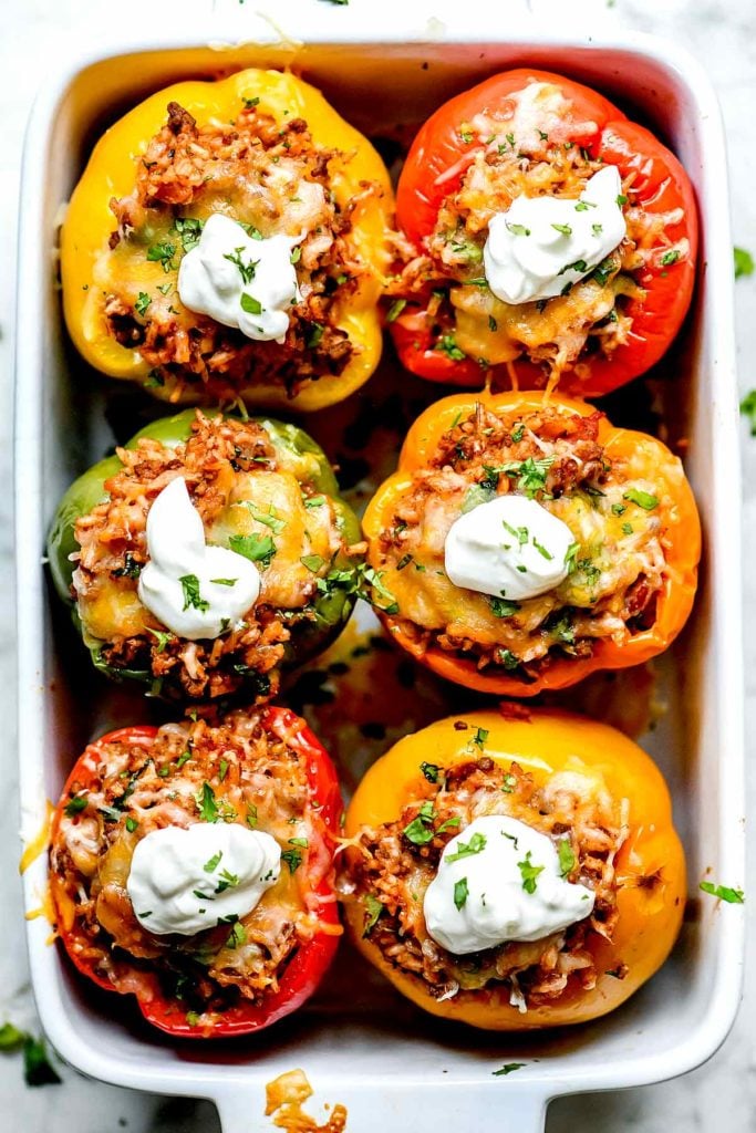Mexican Stuffed Peppers with Cheese | foodiecrush.com #beef #peppers #stuffedpeppers #healthy #easy #mexican #sourcream