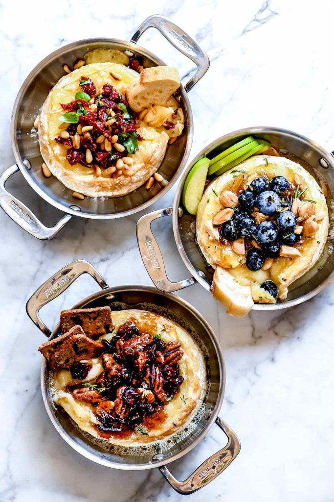 BAKED BRIE WITH CRANBERRIES, PECANS, FIG JAM & THYME