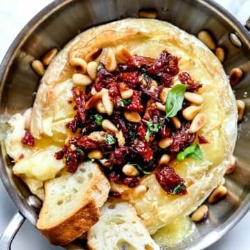 Baked Brie with Sun Dried Tomato and Pine Nuts
