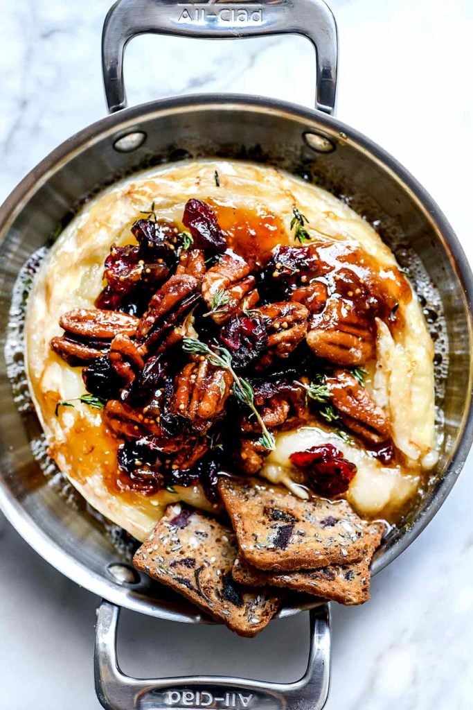 Baked Brie with Cranberries, Pecans, Fig Jam and Thyme | foodiecrush.com #recipes #baked #brie #appetizer #cheese #holidays