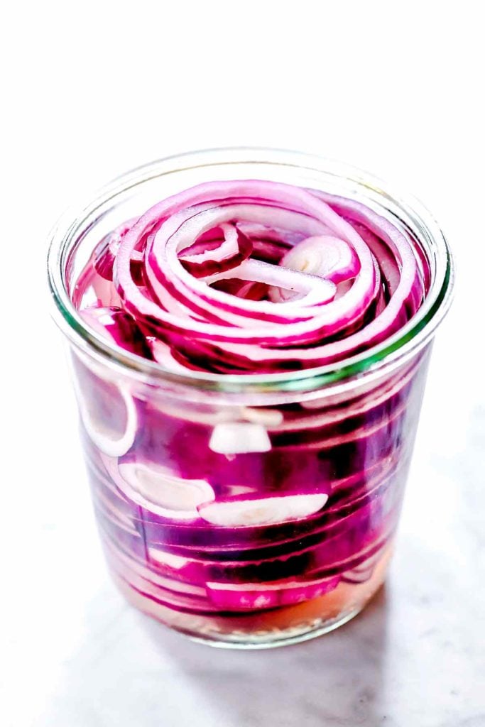 How to Make Quick Pickled Onions | foodiecrush.com #pickled #onions #quick #vinegar #recipe #Mexican