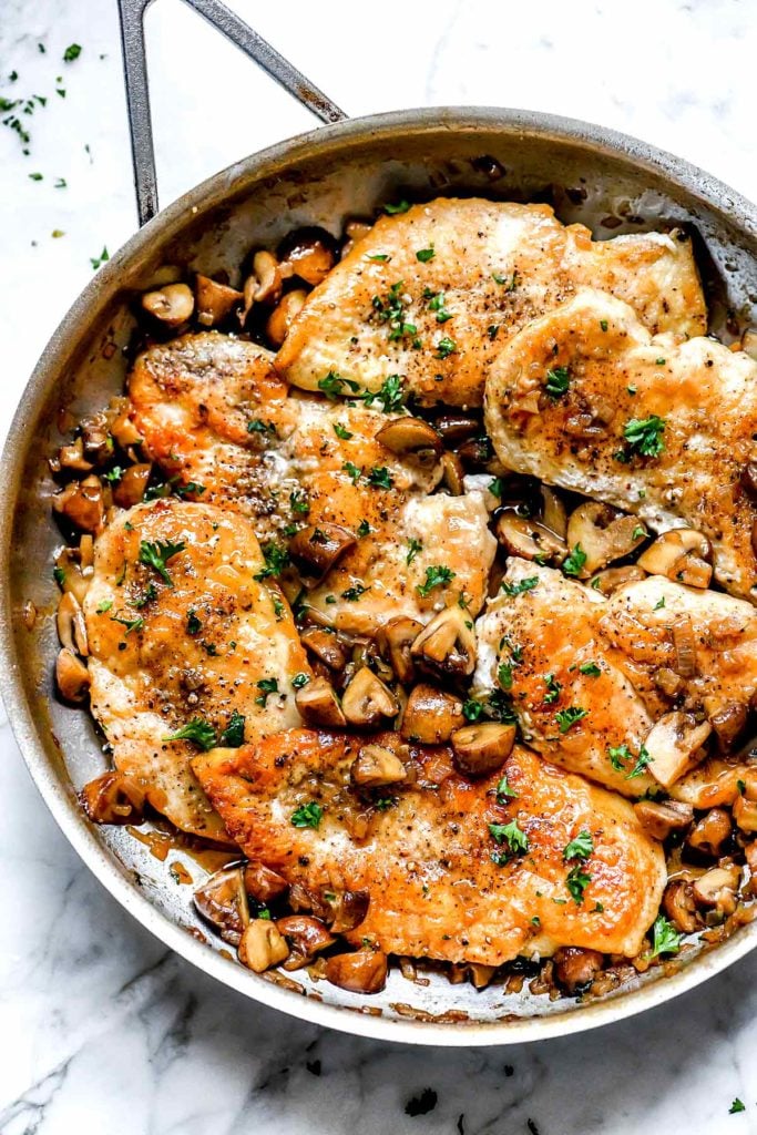 chicken marsala with mushrooms in a skillet